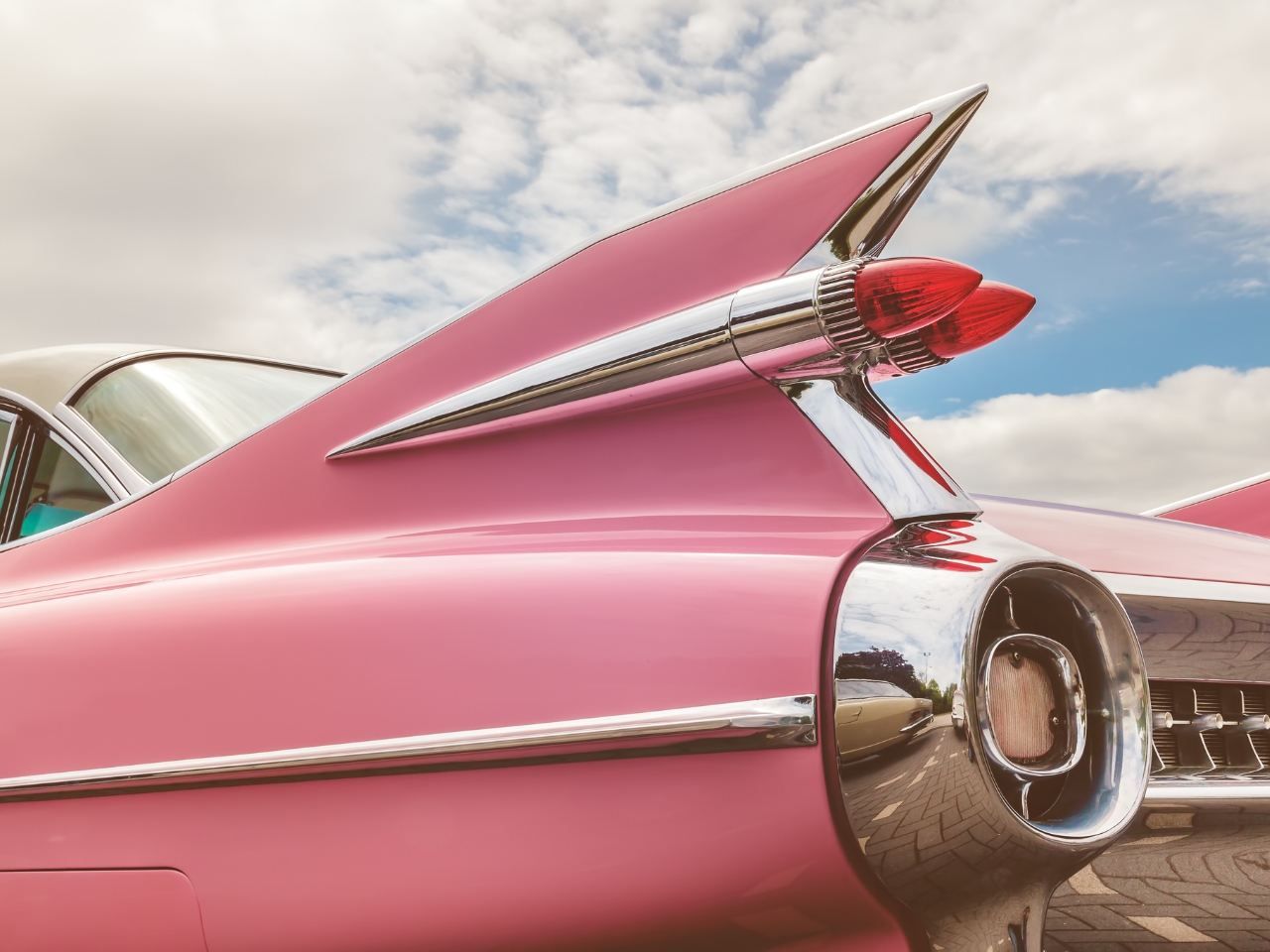 Rear-end of a pink vintage car